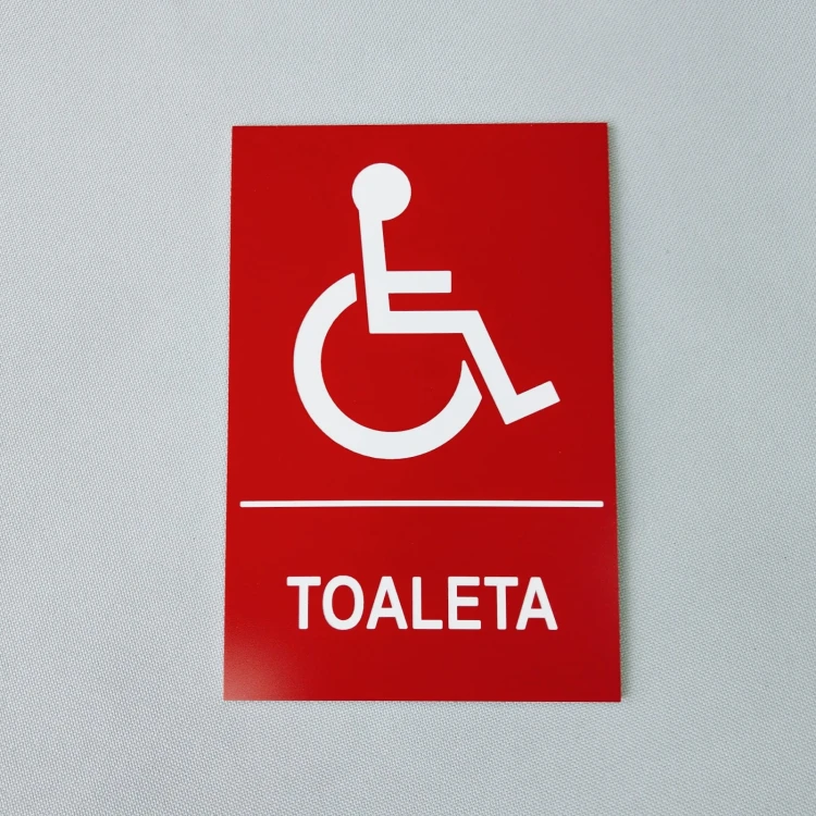 Toaleta dla niepełnosprawnych - tabliczka samoprzylepna kolor czerwony.