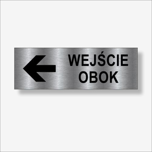 Wejście obok w lewo - tabliczka informacyjna na drzwi.