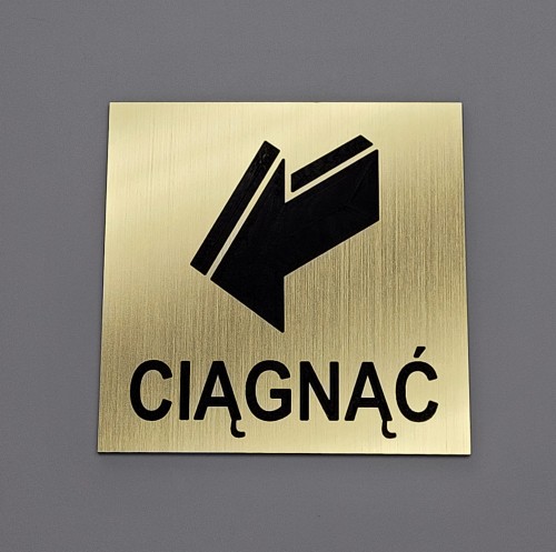 Ciągnąć aby otworzyć - tabliczka informacyjna kolor złoty szczotkowany