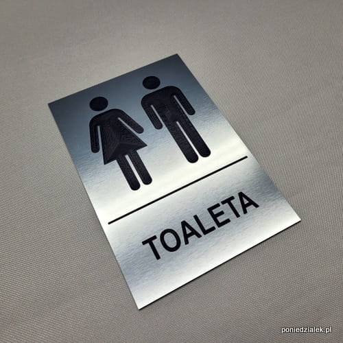 Tabliczka informacyjna na drzwi "Toaleta wspólna" z napisem