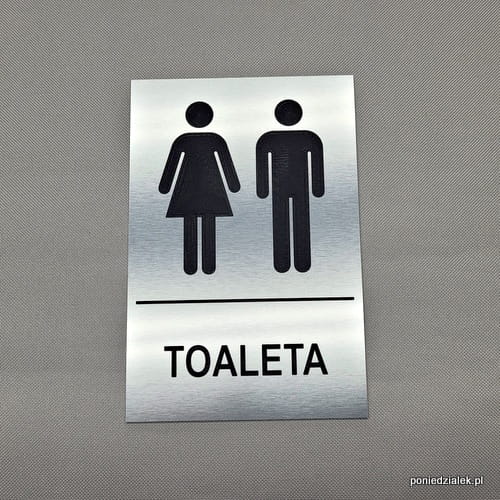 Tabliczka informacyjna na drzwi "Toaleta wspólna" z napisem