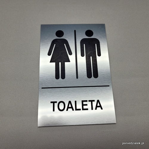 Toaleta wspólna z kabinami - tabliczka-informacyjna-na-drzwi