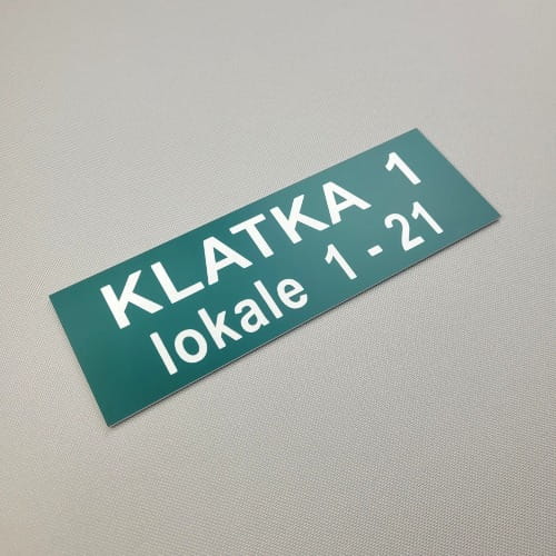 Numery lokali w klatce-Tabliczka grawerowana wielkość 210 x 70 mm. Kolor ciemny zielony