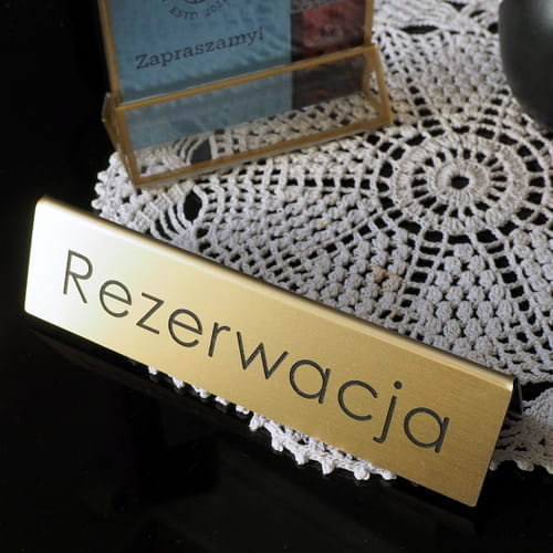 Tabliczka rezerwacja kolor złoty szczotkowany