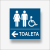 Tabliczka informacyjna wskazująca kierunek do toalety