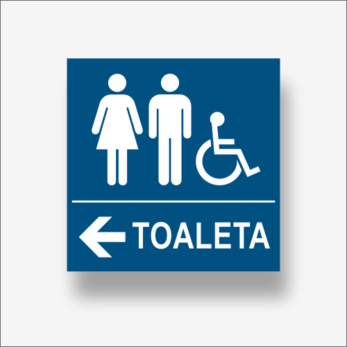 Tabliczka informacyjna wskazująca kierunek do toalety
