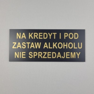 Na kredyt i pod zastaw alkoholu nie sprzedajemy - Tabliczka informacyjna