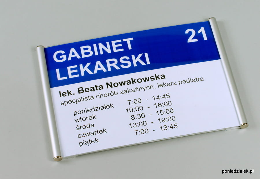 Tabliczka przydrzwiowa z wymienną treścią.